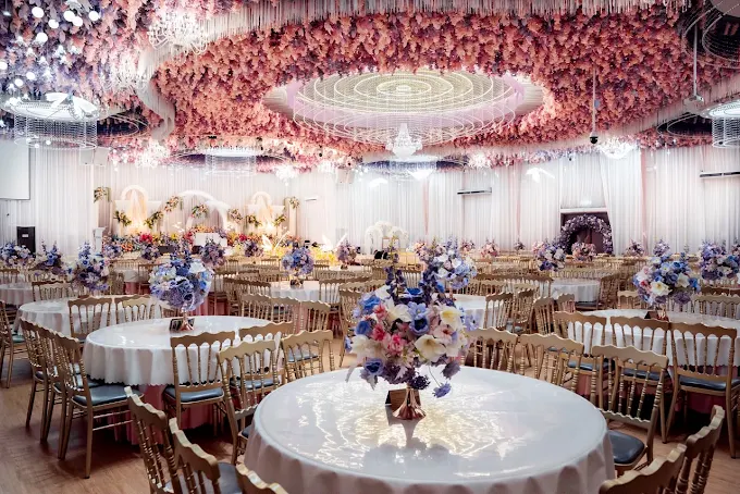 Floral wedding hall with decorated dining tables